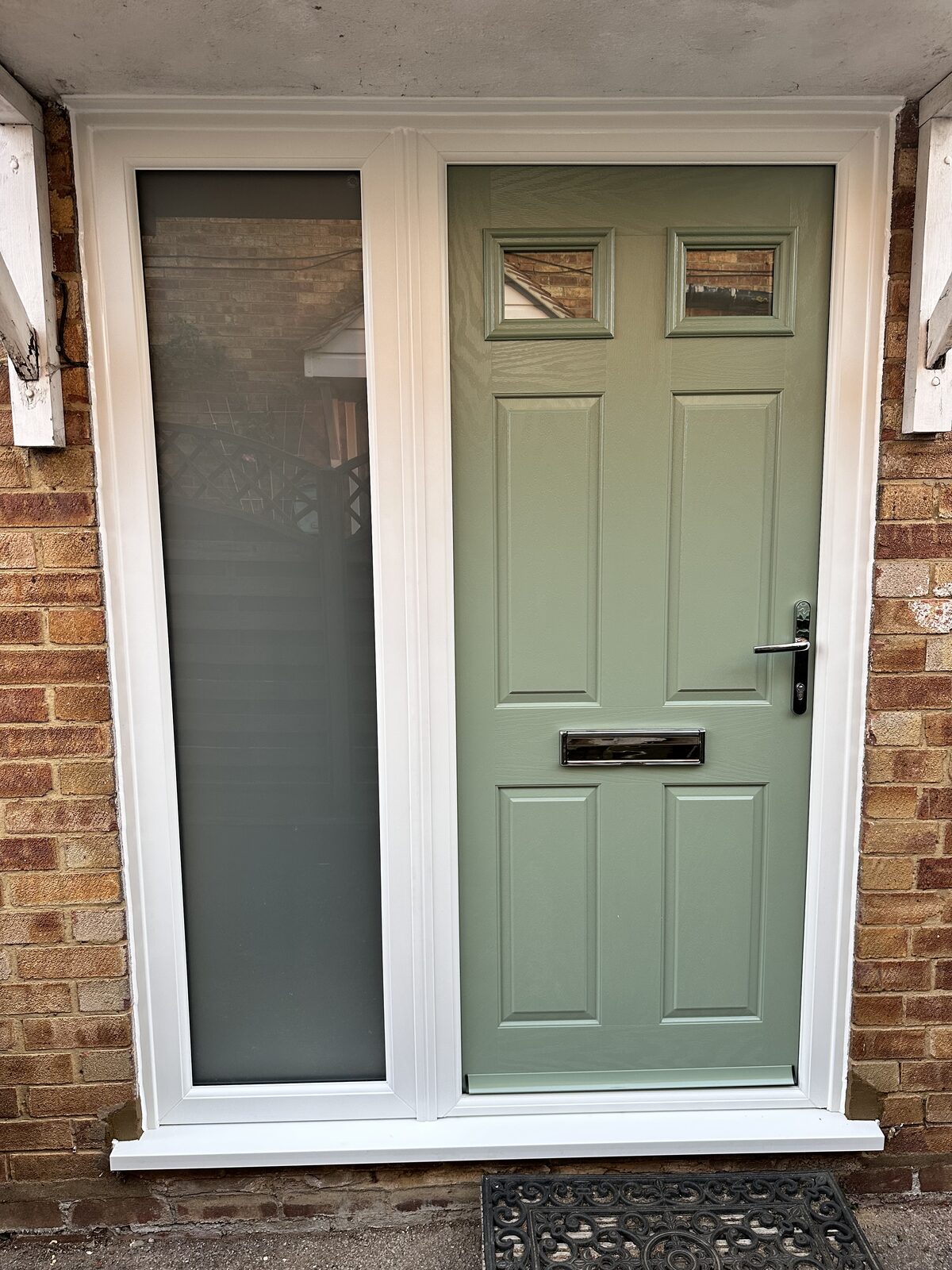 Sage-green panelled door